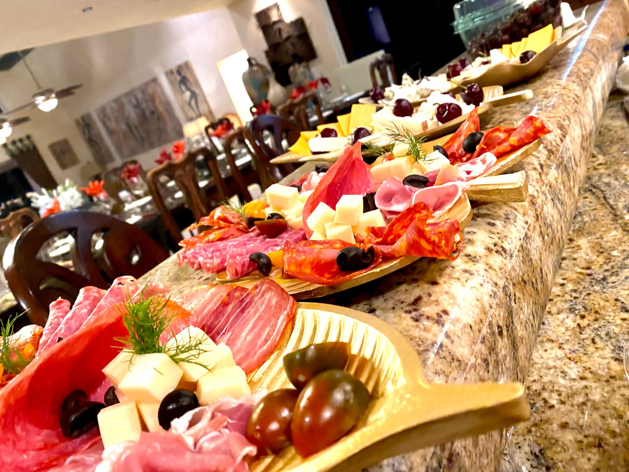 A chef's abundant seafood and grill spread plated for a Los Cabos celebration